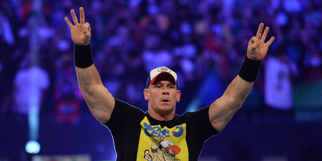 John Cena prepares to battle Roman Reigns with Paul Heyman for the WWE Universal Championship at SummerSlam 2021 at Allegiant Stadium in Las Vegas on August 21, 2021.