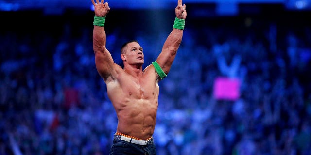 John Cena celebrates his victory during Wrestlemania XXX in New Orleans on April 6, 2014.