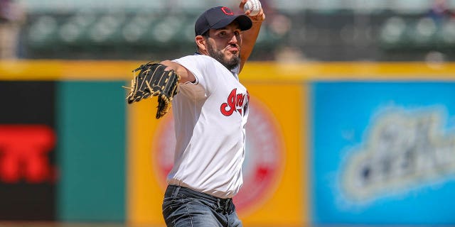 Cleveland native and NXT Champion Johnny Gargano throws a ceremonial first pitch prior to a game between the Miami Marlins and Cleveland Indians April 24, 2019, at Progressive Field in Cleveland.