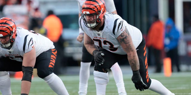 Jonah Williams, #73 of the Cincinnati Bengals, gets set during the second half against the New England Patriots at Gillette Stadium on December 24, 2022, in Foxborough, Massachusetts.