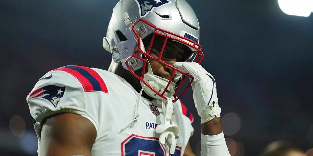 Jonnu Smith of the New England Patriots runs off of the field during the Cardinals game at State Farm Stadium on Dec. 12, 2022, in Glendale, Arizona.