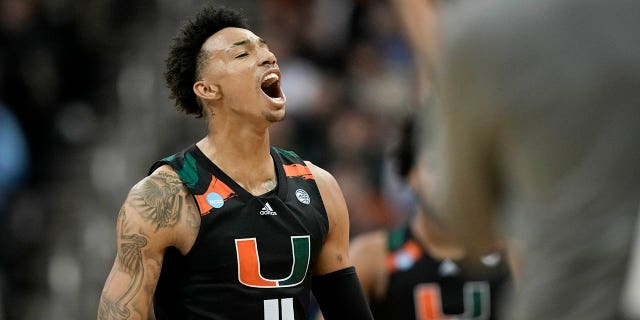 Miami guard Jordan Miller celebrates after scoring against Texas in the second half of an Elite 8 college basketball game in the Midwest Regional of the NCAA Tournament Sunday, March 26, 2023, in Kansas City, Mo.