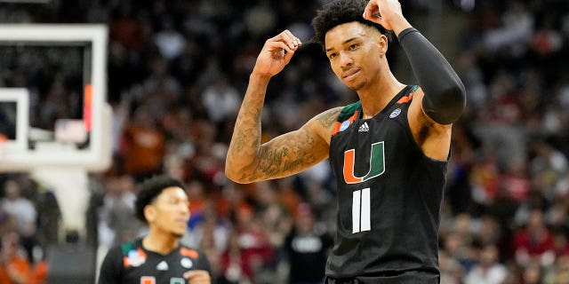 Miami guard Jordan Miller celebrates after scoring against Texas in the second half of an Elite 8 college basketball game in the Midwest Regional of the NCAA Tournament Sunday, March 26, 2023, in Kansas City, Mo.