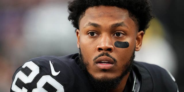 Josh Jacobs, #28 of the Las Vegas Raiders, looks on against the San Francisco 49ers at Allegiant Stadium on Jan. 1, 2023 in Las Vegas.