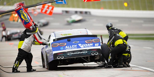 Josh Williams makes a pit stop during the NASCAR Xfinity Series auto race at Atlanta Motor Speedway on Saturday, March 18, 2023, in Hampton, Georgia.