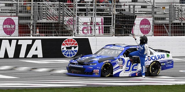 Josh Williams leaves his car after being ordered to park by NASCAR on March 18, 2023 at Atlanta Motor Speedway.