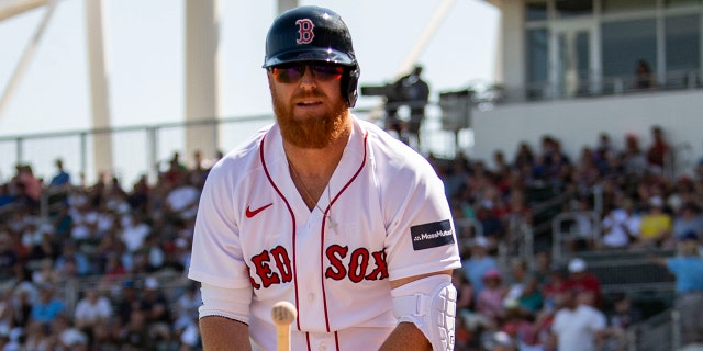 Justin Turner of the Boston Red Sox warms up during the Tampa Bay Rays game on Feb. 26, 2023, in Fort Myers, Florida.