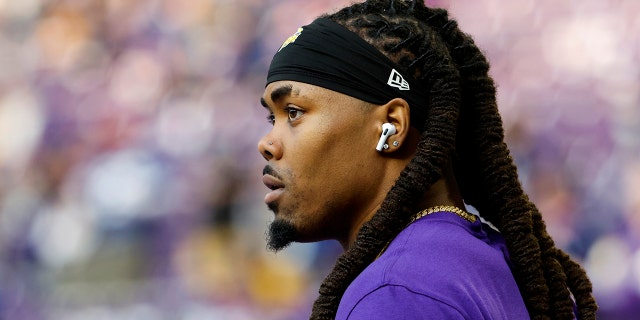 K.J. Osborn #17 of the Minnesota Vikings warms up prior to a game against the New York Giants in the NFC Wild Card playoff game at U.S. Bank Stadium on January 15, 2023 in Minneapolis, Minnesota.
