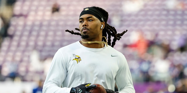 K.J. Osborn #17 of the Minnesota Vikings warms up before the start of the game against the New York Giants at U.S. Bank Stadium on December 24, 2022 in Minneapolis, Minnesota. The Vikings defeated the Giants 27-24.