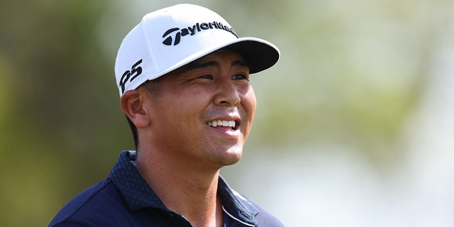 Kurt Kitayama of the United States smiles on the seventh hole during the final round of the Arnold Palmer Invitational presented by Mastercard at Arnold Palmer Bay Hill Golf Course on March 05, 2023 in Orlando, Florida.