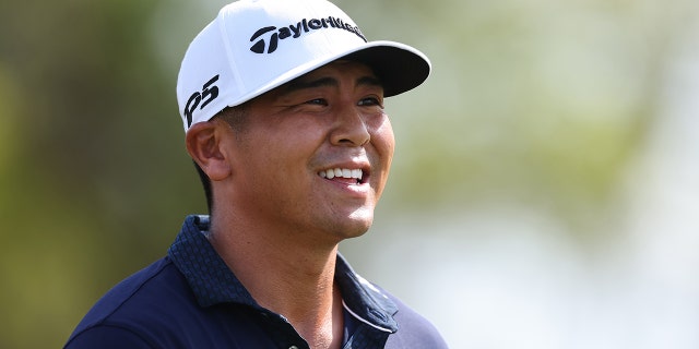 Kurt Kitayama of the United States smiles on the seventh hole during the final round of the Arnold Palmer Invitational presented by Mastercard at the Arnold Palmer Bay Hill Golf Course on March 5, 2023 in Orlando, Florida.