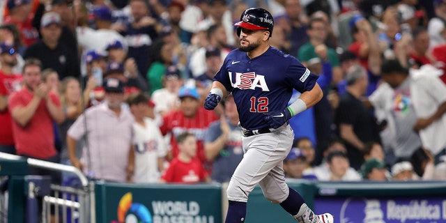 Team USA's Kyle Schwarber rounds the bases after hitting a solo home run in the eighth inning against Team Japan during the World Baseball Classic championship game at LoanDepot Park on March 21, 2023 in Miami, Florida.