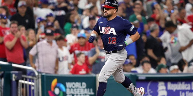 Team USA's Kyle Schwarber rounds the bases after hitting a solo home run in the eighth inning against Team Japan during the World Baseball Classic championship game at LoanDepot Park on March 21, 2023 in Miami, Florida.