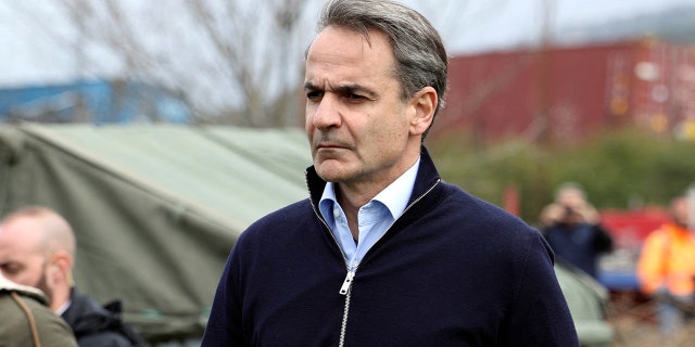 Greek Prime Minister Kyriakos Mitsotakis visited the site of a crash, where two trains collided, near the city of Larissa, Greece, on Wednesday.