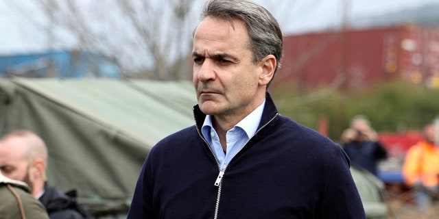 Greek Prime Minister Kyriakos Mitsotakis visited the site of a crash, where two trains collided, near the city of Larissa, Greece, on Wednesday.