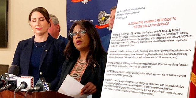 Jerretta Sandoz, right, discusses the Los Angeles Police Protective League's proposals to stop sending officers to more than two dozen types of 911 calls during a news conference in Los Angeles, Wednesday, March 1, 2023.