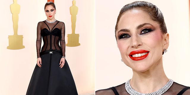 Lady Gaga stayed on trend wearing a black Versace gown with see-through details.