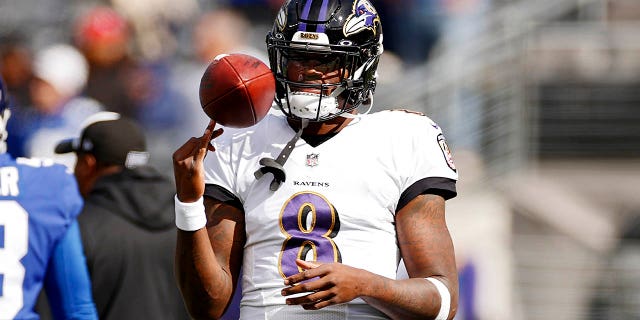 Lamar Jackson, #8 of the Baltimore Ravens, warms up prior to the game against the New York Giants at MetLife Stadium on Oct. 16, 2022 in East Rutherford, New Jersey.