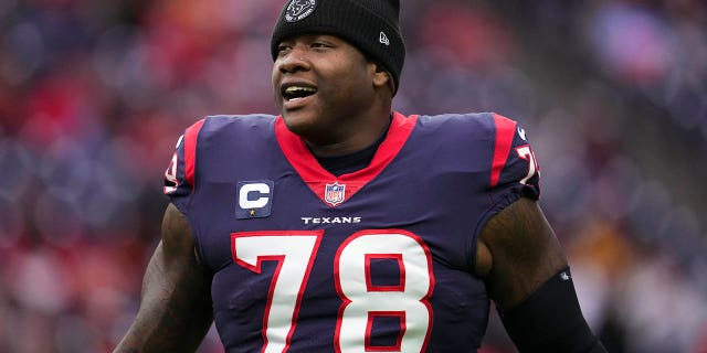 Texans' Laremy Tunsil runs onto the field for the Kansas City Chiefs game at NRG Stadium on December 18, 2022 in Houston.