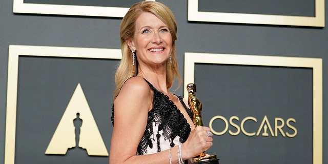 Laura Dern holding her Oscar, which she won for her role in "Marriage Story" in 2020