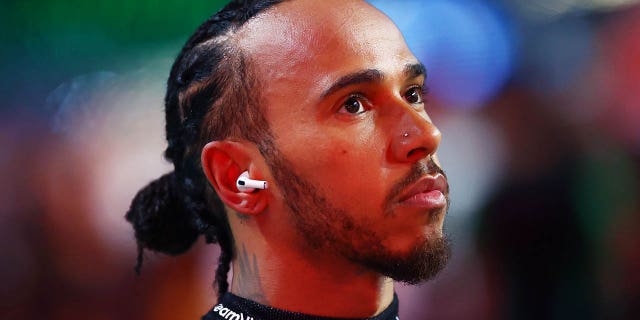 Lewis Hamilton of Great Britain and Mercedes looks on before the Saudi Arabian F1 Grand Prix at Jeddah Corniche Circuit on March 19, 2023 in Jeddah, Saudi Arabia.