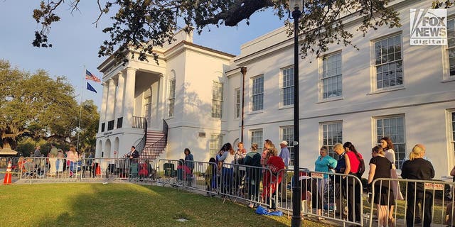Spectators line up outside the Colleton County Courthouse in Walterboro, South Carolina, on Thursday to snag a seat in the courtroom.