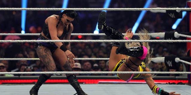 Rhea Ripley, left, and Liv Morgan wrestle during the women’s WWE Royal Rumble at the Alamodome in San Antonio on Jan. 28, 2023.