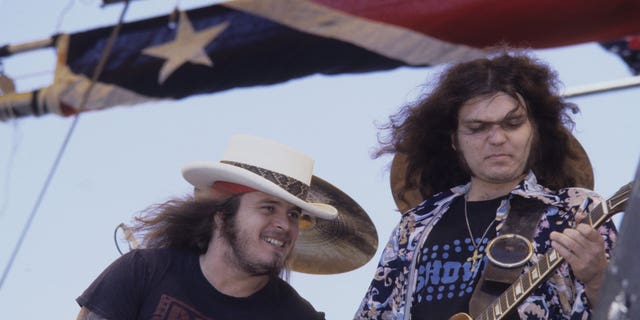 Ronnie Van Zant (left) and five others were killed in the 1977 plane crash which Gary Rossington survived. 