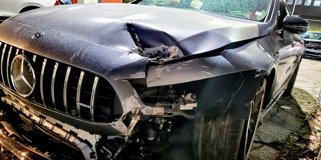 A dark-colored Mercedes-Benz was significantly damaged from the crash involving Pete Davidson.
