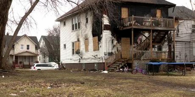 A Michigan family's duplex caught fire in the top level after the other tenant’s kids were playing with a lighter.