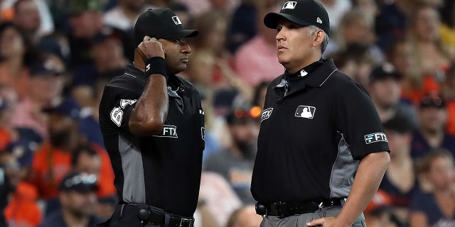 How Zoom will help MLB umpires make replay calls in 2023 season 4 Umpire Alan Porter #64, left, and Manny Gonzalez #79 review a call between the Miami Marlins and Houston Astros at Minute Maid Park on June 11, 2022 in Houston, Texas.