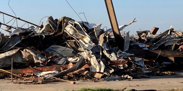 Debris covers a damaged structure in Rolling Fork, Miss,. on Saturday, March 25, 2023. Powerful tornadoes tore through the Deep South on Friday night, killing several people in Mississippi, obliterating dozens of buildings.