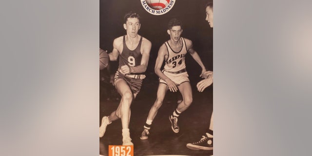 Hebron High School star Phil Judson drives with the ball in the 1952 Illinois High School Association boys basketball tournament. Tiny Hebron High beat much larger schools to win the state title in 1952. Its shocking success is considered an inspiration for "Hoosiers," about a similarly small high school that beats larger teams to win the Indiana state title.