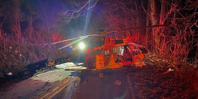 All four people onboard the medical helicopter that crashed in Macon County, North Carolina survived, Macon County Emergency Services says.