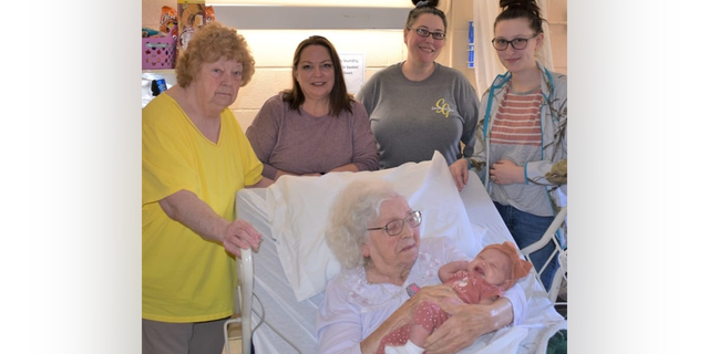 MaeDell Taylor Hawkins, 98, got to hold her 7-week-old great-great-great-granddaughter Zhavia Whitaker on Feb. 18, 2023. The pair were surrounded by four of MaeDell Hawkins' living descendants: Frances Snow, Gracie Snow Howell, Jacqueline Ledford and Jaisline Wilson.