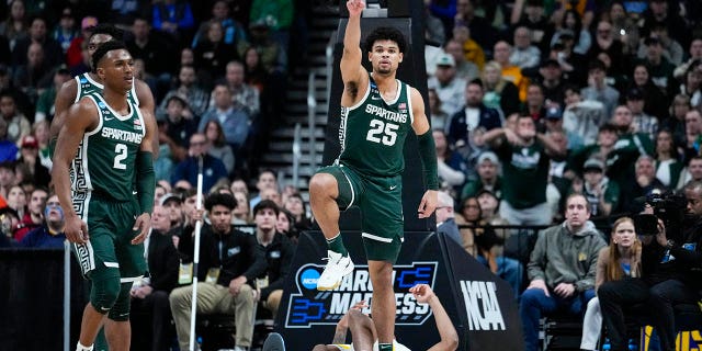 Michigan State forward Malik Hall (25) celebrates a turnover by Marquette in the second half of a second-round college basketball game in the men's NCAA Tournament in Columbus, Ohio, Sunday, March 19, 2023.