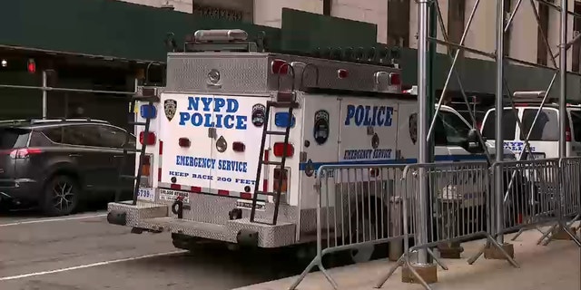 A New York police vehicle is seen near the Manhattan District Attorney's Office on Friday.