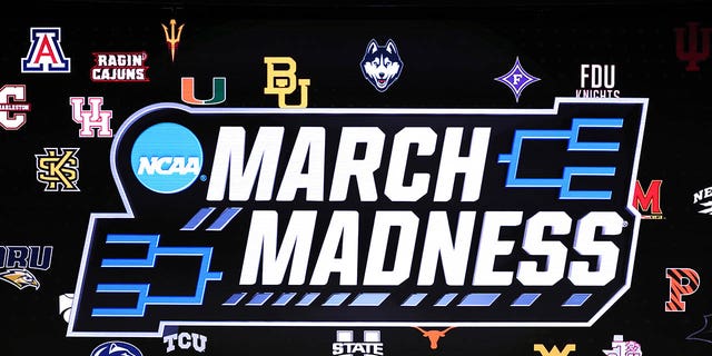 A detailed view of the March Madness logo is seen prior to the first round game between the Utah State Aggies and the Missouri Tigers in the NCAA Men's Basketball Tournament at the Golden 1 Center on March 16, 2023 in Sacramento, California.