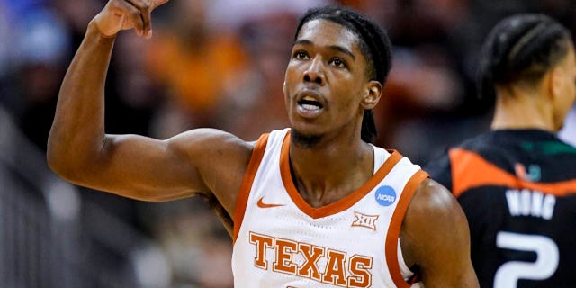 Mar 26, 2023; Kansas City, MO, USA; Texas Longhorns guard Marcus Carr (5) reacts against the Miami Hurricanes in the second half at the T-Mobile Center.