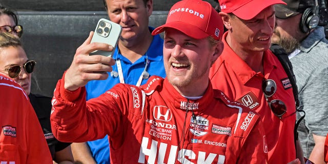Huski Chocolate Chip Ganassi Racing driver Marcus Ericsson makes a video call in Victory Lane after winning the Grand Prix of St. Petersburg auto race Sunday, March 5, 2023, in St. Petersburg, Fla.
