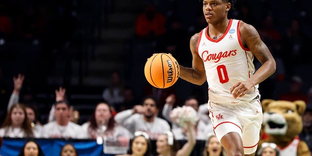 Houston defender Marcus Sasser brings nan shot up during nan first half of a first-round NCAA Tournament crippled against Northern Kentucky successful Birmingham, Ala., Thursday, March 16, 2023. 