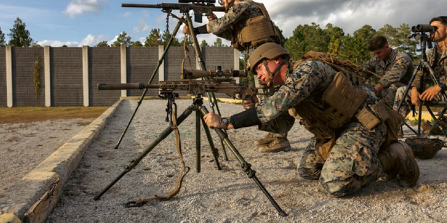 U.S. Marines with 2d Battalion, 2d Marine Regiment, 2d Marine Division, fire at targets at Camp Lejeune, North Carolina, on Oct. 13, 2022. 