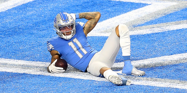 Detroit Lions wide receiver Marvin Jones poses after scoring during the second half of a game against the Minnesota Vikings in Detroit Jan. 3, 2021.