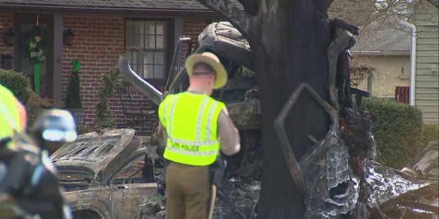 Police and firefighters respond to the scene of a fiery Frederick, Maryland tanker truck crash, Saturday, March 4, 2023.