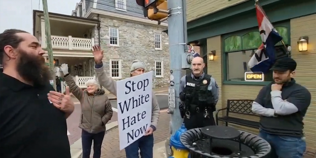 Protesters argue outside of Dan’s Restaurant and Taphouse in Boonsboro, Maryland on February 25, 2023.