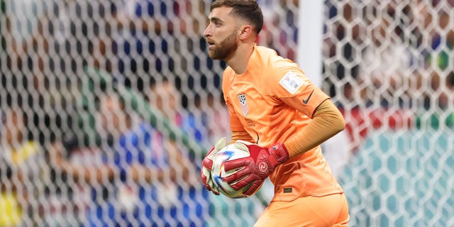Matt Turner looks for an open man during a FIFA World Cup match against England at Al Bayt Stadium on Nov. 25, 2022, in Al Khor, Qatar.