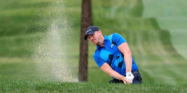 Matt Wallace hits out of the sand to the first green during the Valspar Championship, Saturday, March 18, 2023, at Innisbrook in Palm Harbor, Florida.