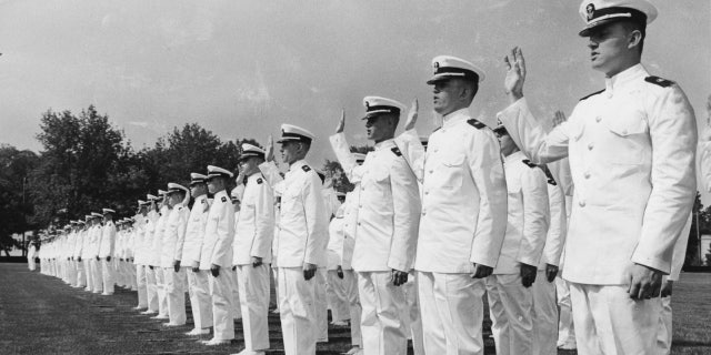 New cadet midshipmen of the Class of 1972 at the U.S. Merchant Marine Academy in Kings Point, New York, are sworn in to the Naval Reserve on Aug. 31, 1968.