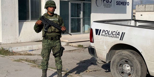 A Mexican army soldier guards the Tamaulipas State Prosecutor´s headquarters in Matamoros, Mexico, on March 8, 2023.