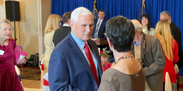 Former Vice President Mike Pence, a potential 2024 Republican presidential candidate, speaks with party activists in New Hampshire before keynoting the Cheshire County GOP annual Lincoln-Reagan fundraising dinner, on March 16, 2023, in Keene, N.H. 